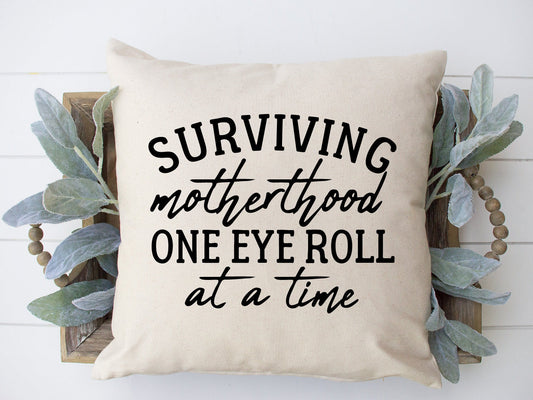 Surviving Motherhood Throw Pillow